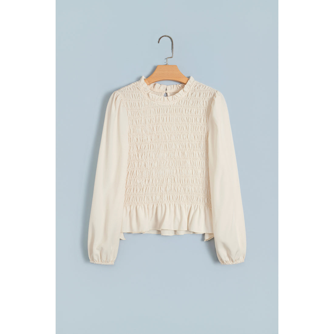 Blusa avorio arricciata con maniche a palloncino — vista frontale