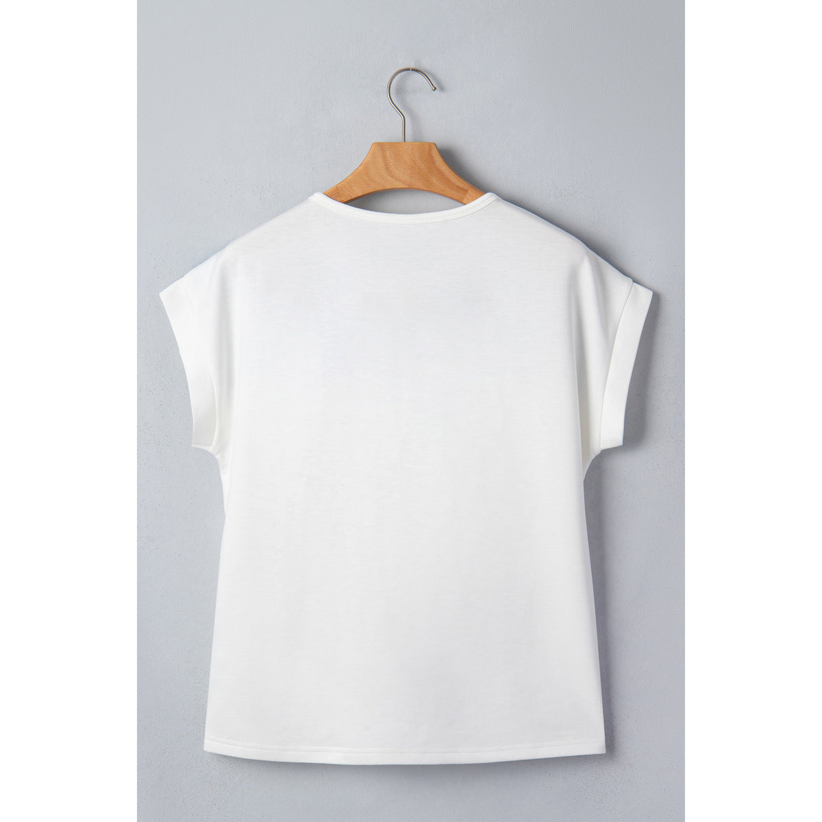 Blusa bianca a maniche corte con inserti floreali — vista posteriore