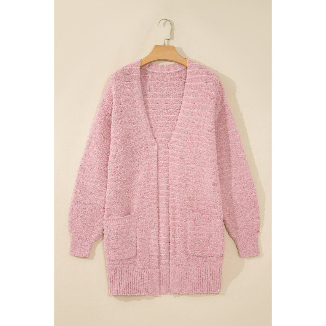 Cardigan aperto rosa chiaro in maglia soffice a costine — vista frontale