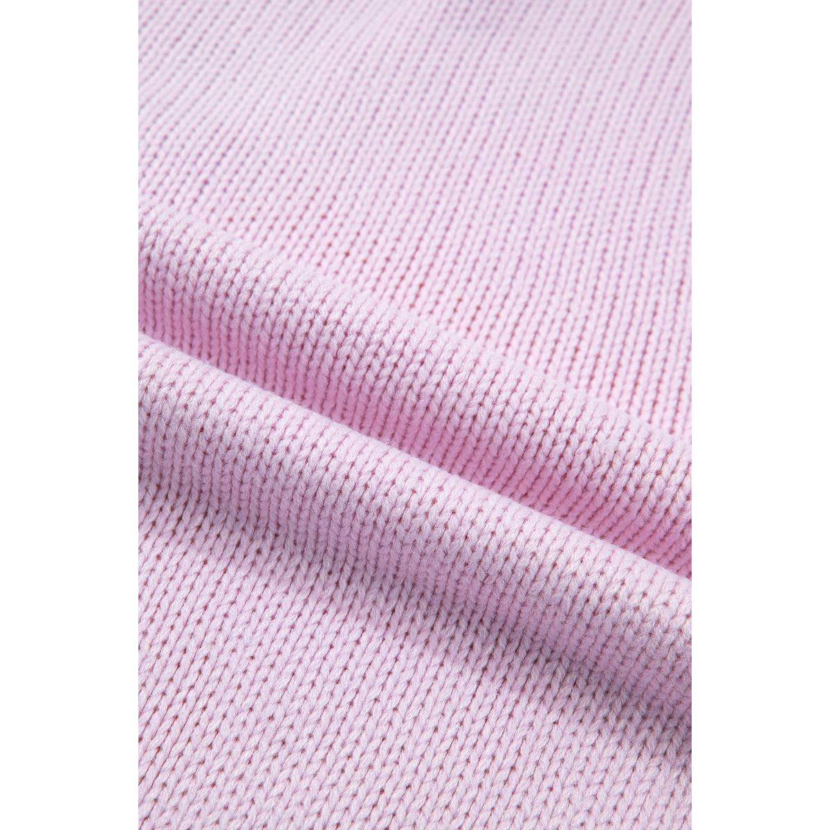 Cardigan in maglia patchwork pastello con scollo a V — dettaglio della lavorazione a maglia