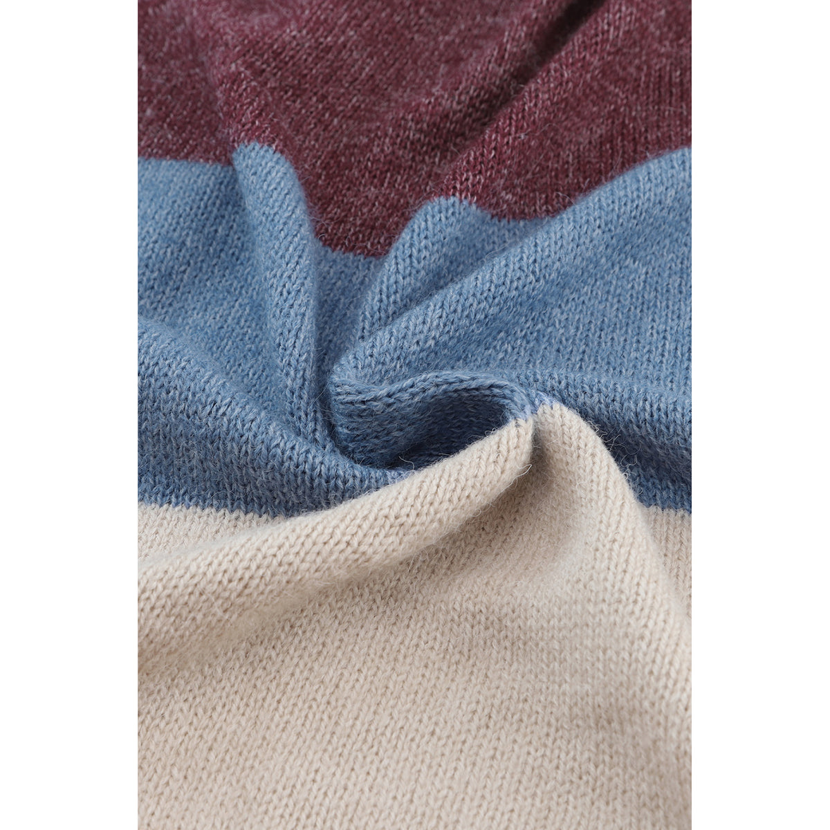 Cardigan lungo multicolore a blocchi di colore — dettaglio del tessuto a maglia