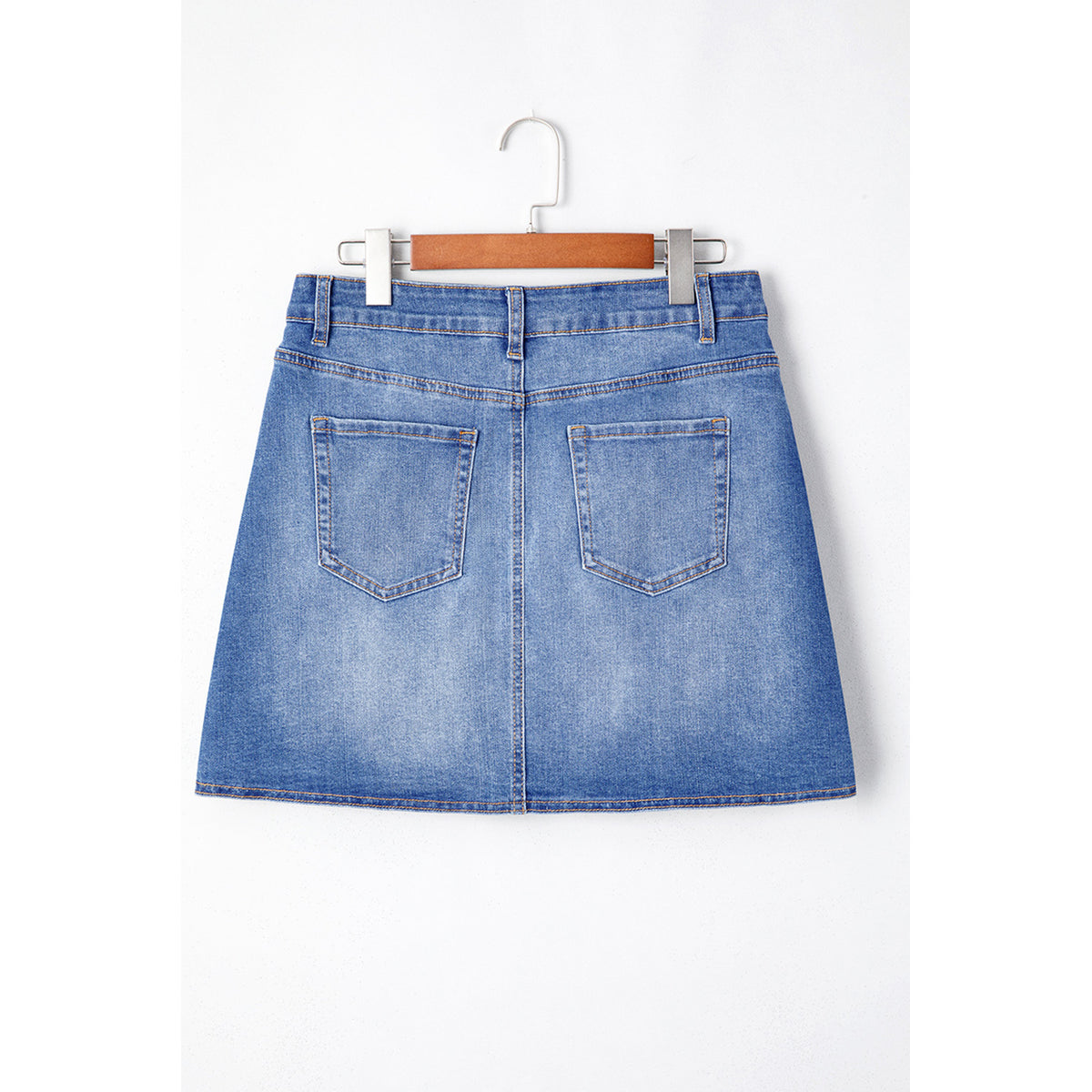 Minigonna in denim blu con vita incrociata — vista posteriore