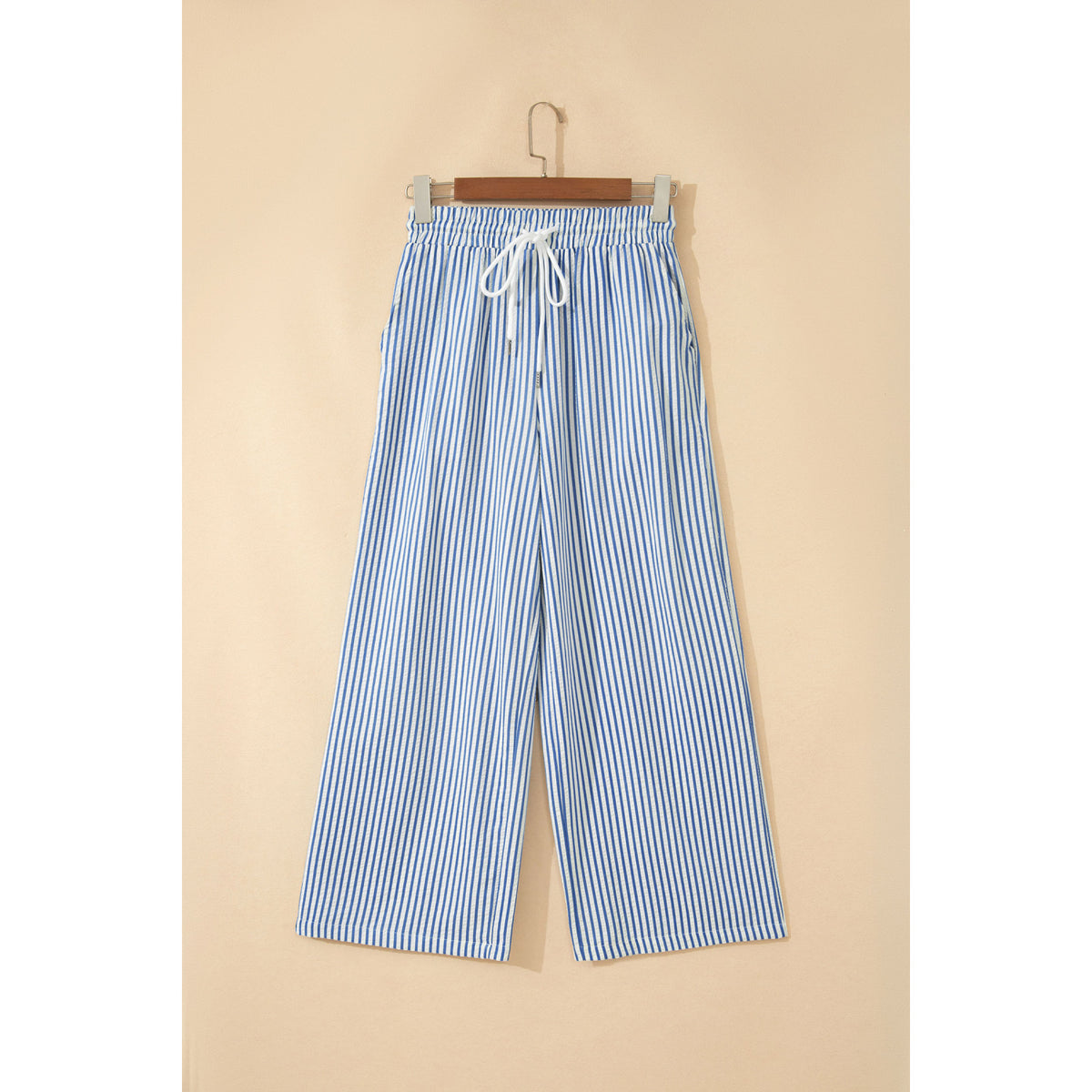 Pantaloni alla caviglia a righe blu con coulisse — vista frontale
